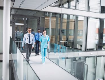 doctors-nurse-walking-corridor